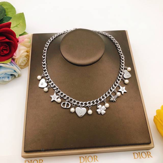 The Lvvers necklace from Donkey House interprets the eye-catching style with sim