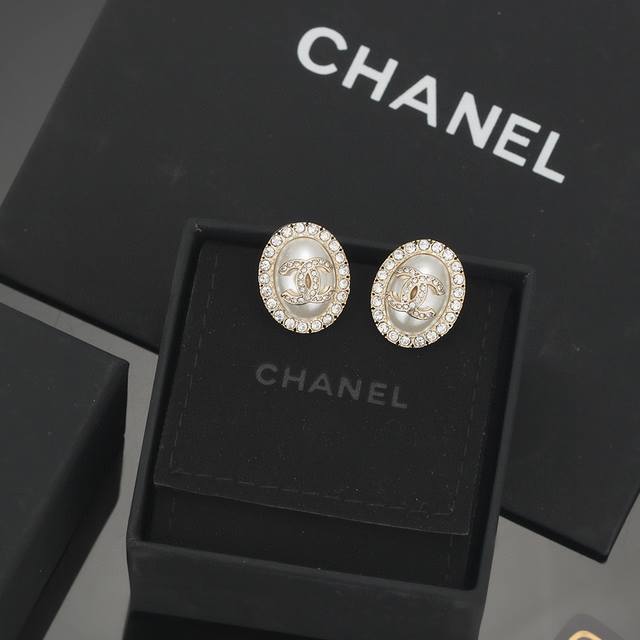 The exquisite full diamond cross spiral earrings from the famous brand Graff are