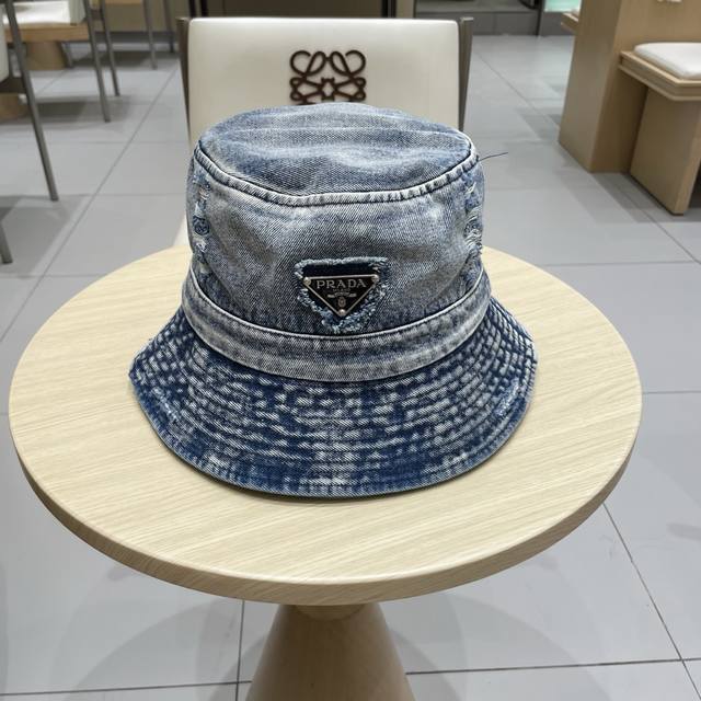Prada 2025 new washed soft denim men's and women's fisherman hat Simple folding