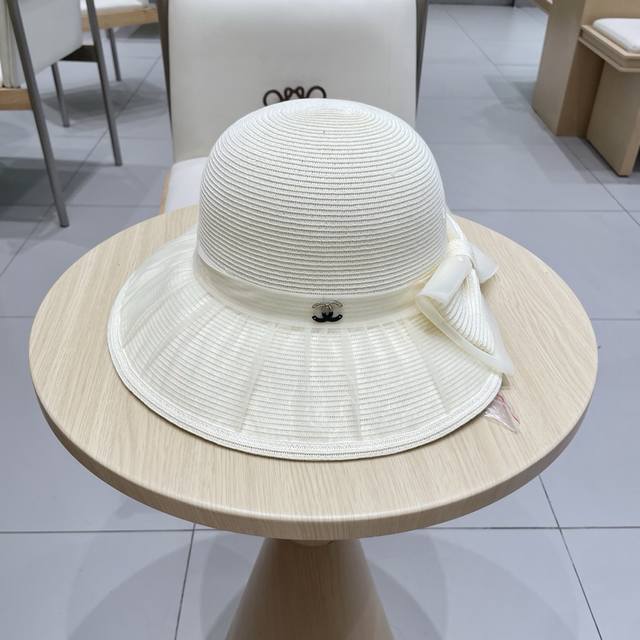 Chanel Chanel 2025 new fashion rhinestone bow straw hat female summer breathable
