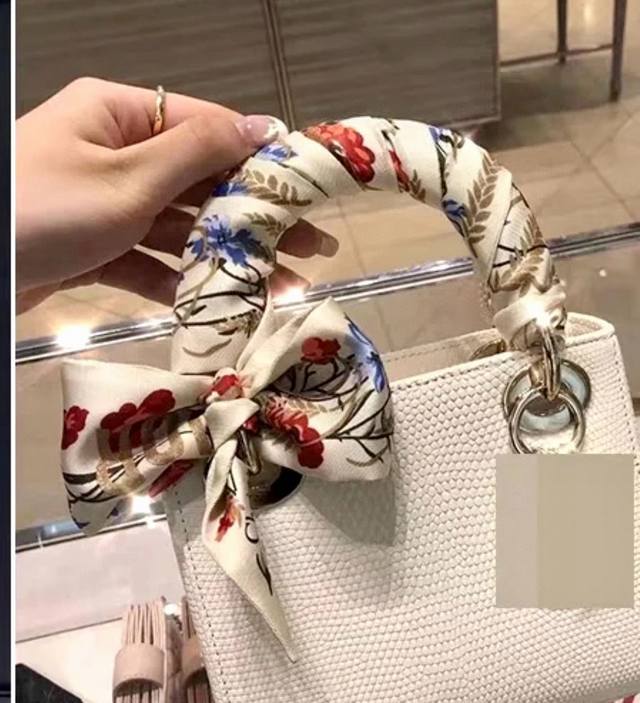 This mulberry flower scarf has a pattern as gorgeous as a spring garden, colorfu
