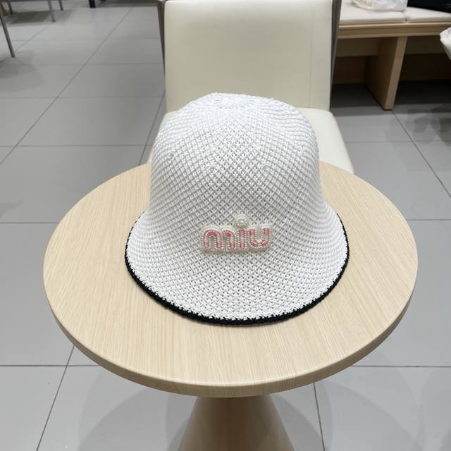 Miumiu Miu Miu new spring and summer black and white woven fisherman hat basin h