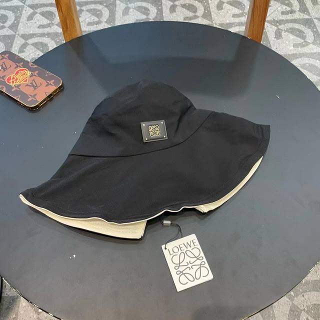 Loewe's new wide-brimmed bow sunshade bucket hat ~ simple and elegant full of li