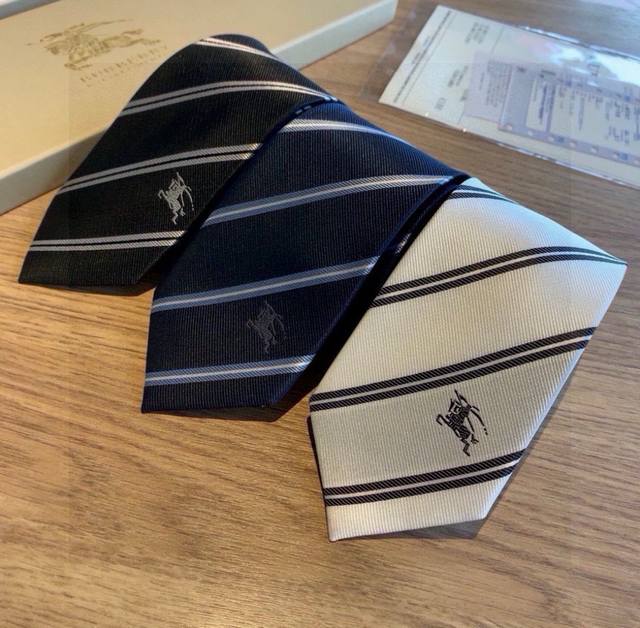 Burberry's new style tie is now available. It is an ideal choice for showing exq