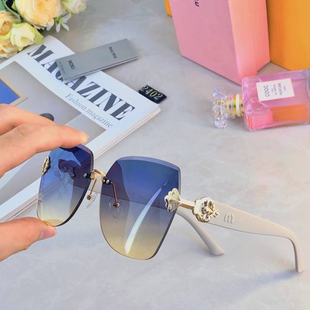 Miumi*2025 new large frame light luxury frameless fashion sunglasses for women U