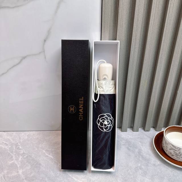 Chanel new summer fully automatic folding umbrella Black coating sunscreen effec