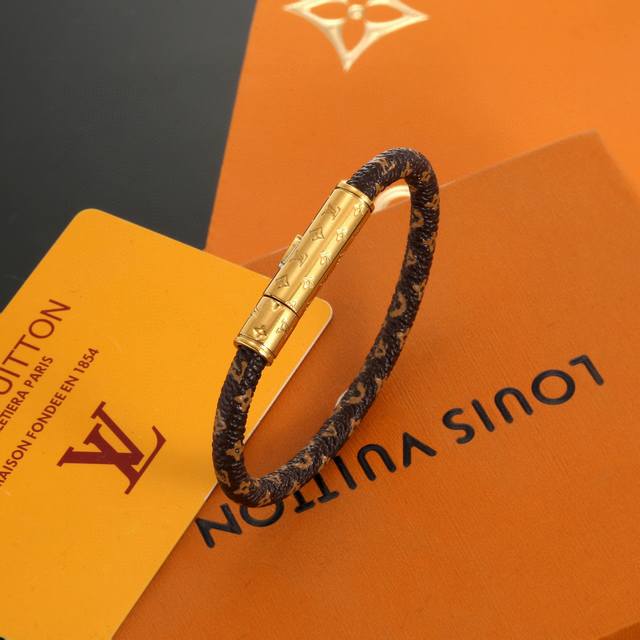 Couple's Lv Circle reversible bracelet features the iconic monogram canvas and g