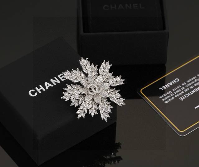 Chanel counters have launched new Chanel snowflake brooches, which are the most