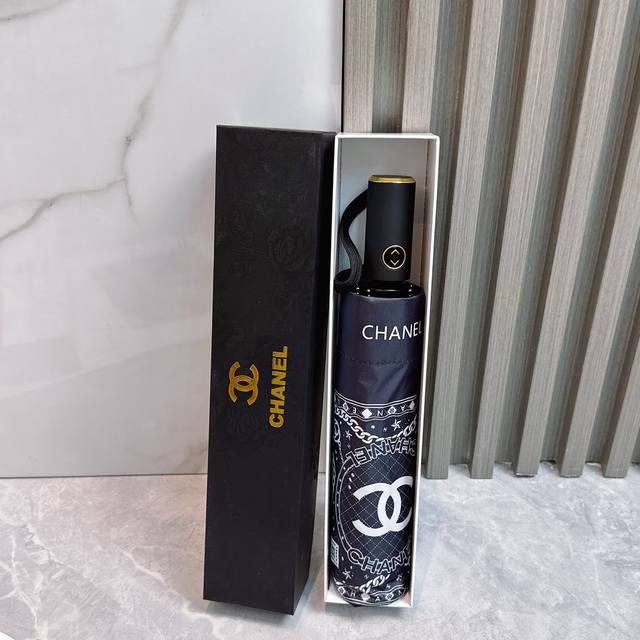 Chanel bow summer new fully automatic folding umbrella Black coating sunscreen e
