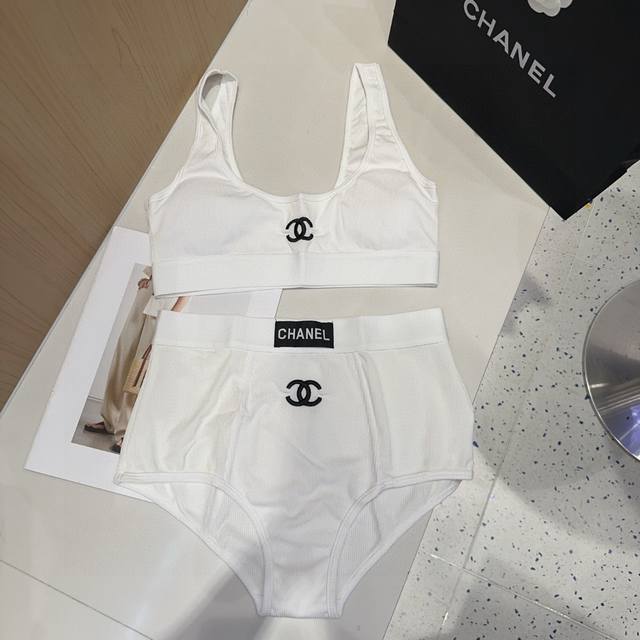 Chanel swimsuit, a must-have for fashionistas. Super figure-flattering! Sml