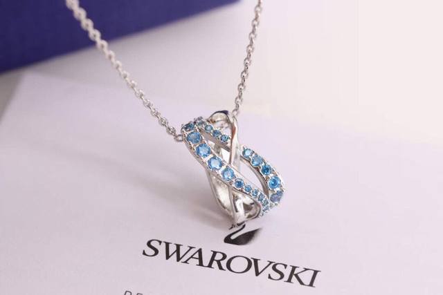 Swarovski Blue Diamond Spiral Interlaced Bead Necklace This pendant injects new