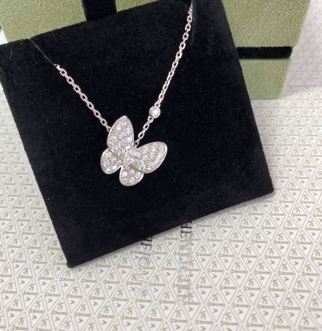 Fine crafted version of Van Cleef & Arpels' popular Vca full diamond butterfly n