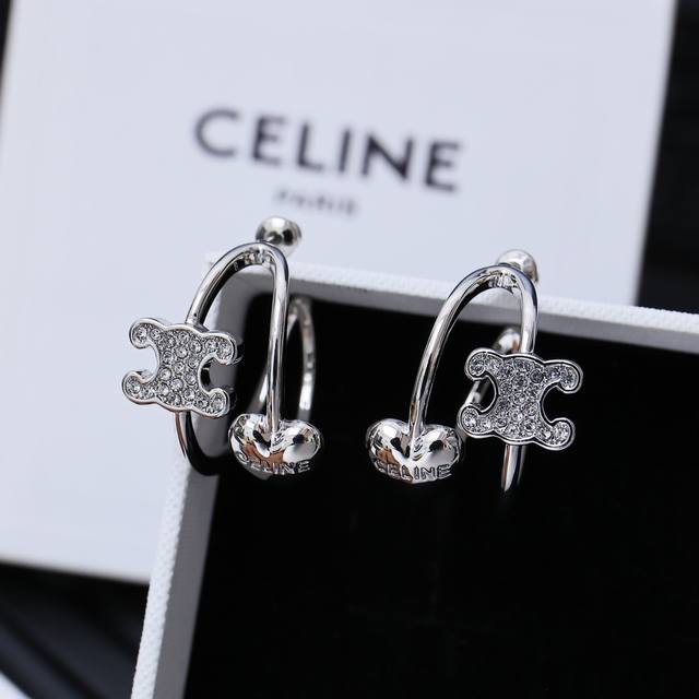 Celine Arc de Triomphe hot-selling asymmetrical heart earrings Reclous new simpl