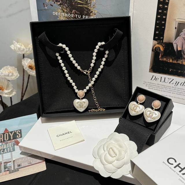 No. Xxl0114 Necklace No. Xed0691 Earrings Pearl pink heart necklace Popular pear