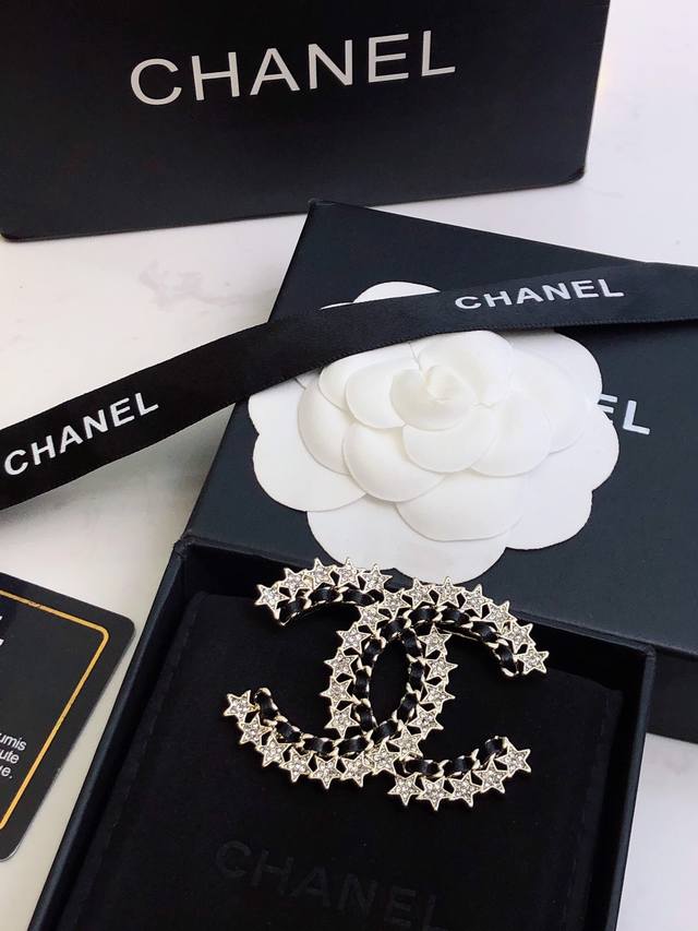 Chanel's new classic double C brooch is presented in real details on the officia