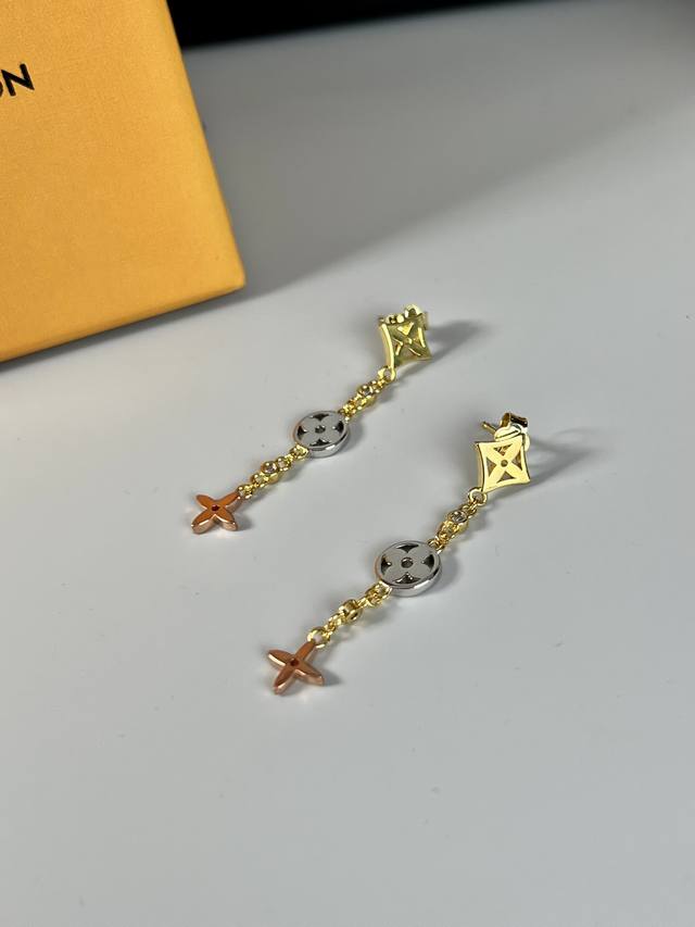 Lv gold diamond monogram pattern earrings, inspired by the classic star-shaped M