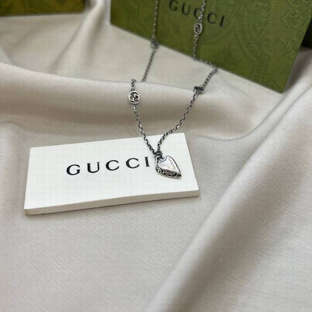 Gucci interlocking double G heart pendant engraved necklace