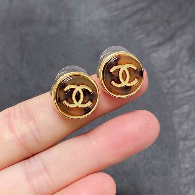 Chanel Double C earrings are very good-looking no matter what you match them wit