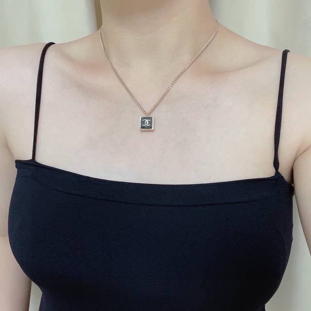 Chanel's latest black square leather necklace with coffee gold color retention i