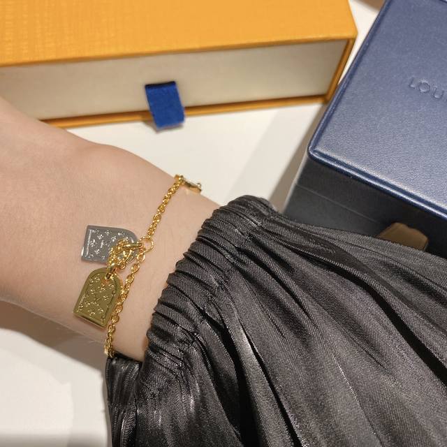 No. Lsl0010 Bracelet No. Lxl0031 Necklace Lous Vuitton Louis Vuitton Gold and Si