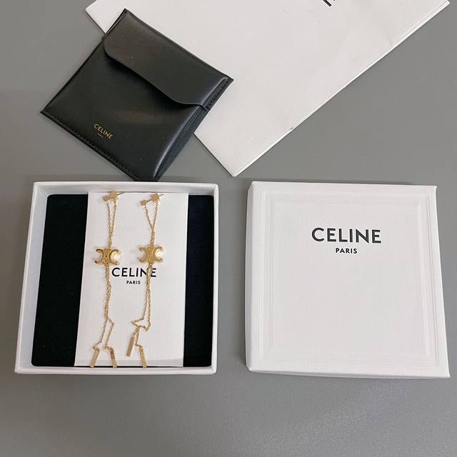We produce C Arc de Triomphe tassel earrings Z 6500, creating a classic logo tha