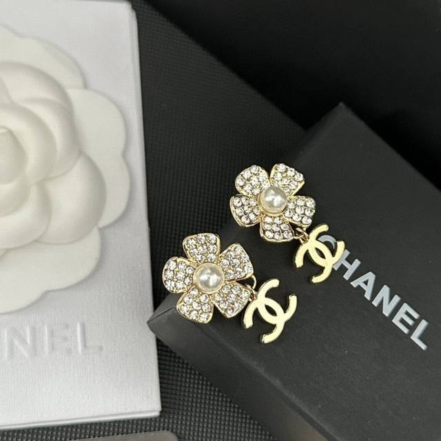 Chanel23S Camellia Pearl Letter Earrings are made of brass and decorated with Sw