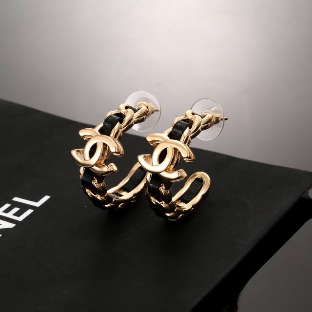 Chanel classic black leather double C earrings. This is a very good-looking and
