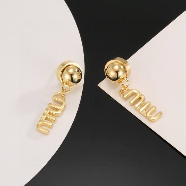 Miu Miu's new Swarovski letter earrings are made of original sterling silver. Th