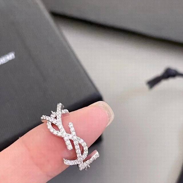 Yves Saint Laurent ring, with a strong metallic texture, made of original brass,