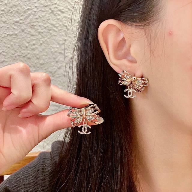 Chanel bow double C diamond earrings