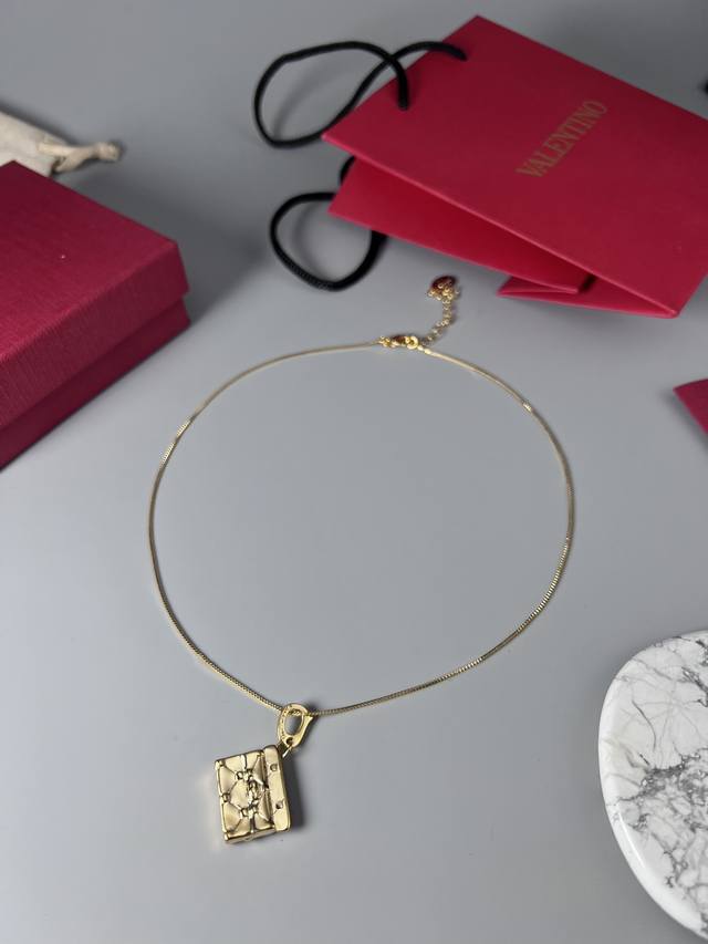 Valentino bag necklace