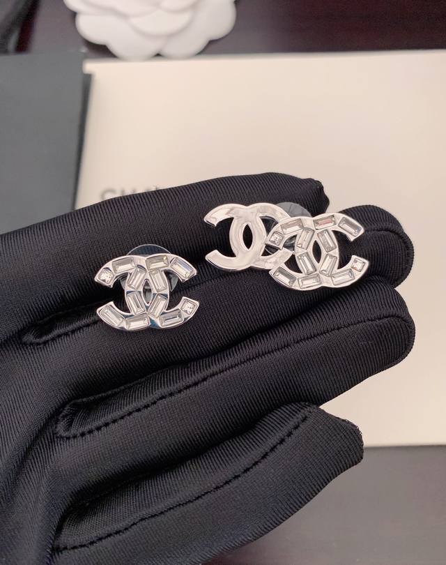 Ch*Nel latest asymmetrical Cc earrings consistent with Z batch material