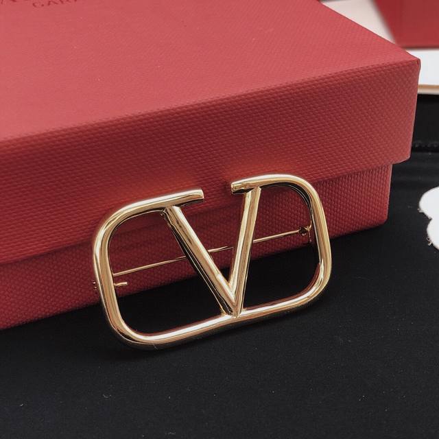 No. Valentino brooch glossy