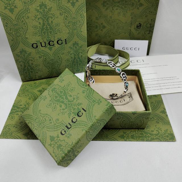 Gucci Daisy Bracelet The brand's classic double G logo and floral patterns are a