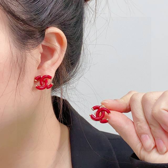 Chanel earrings in New Year red, crystal clear. Chanel's styles really need no i