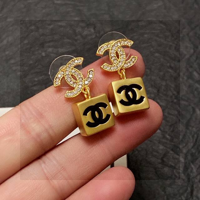 Chanel's new double C letter diamond-studded gold earrings are available at the