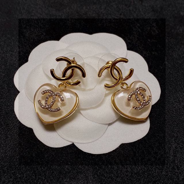 Chanel classic white heart double C earrings. This is a very good-looking and ve