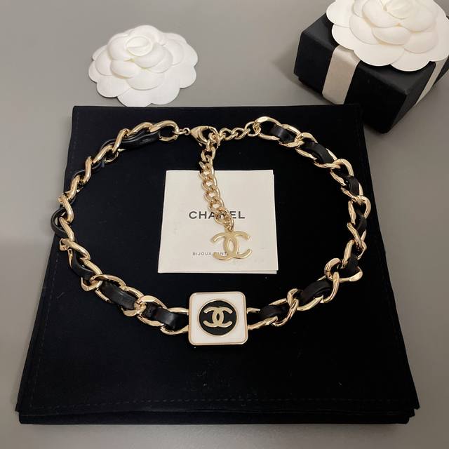Our product is the black and white contrast square black leather Choker Z 7700,