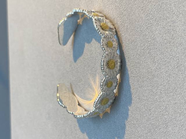 V gold version Seiko Buccellati gemstone daisy bracelet