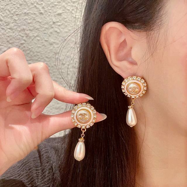 Chanel pearl double C diamond earrings