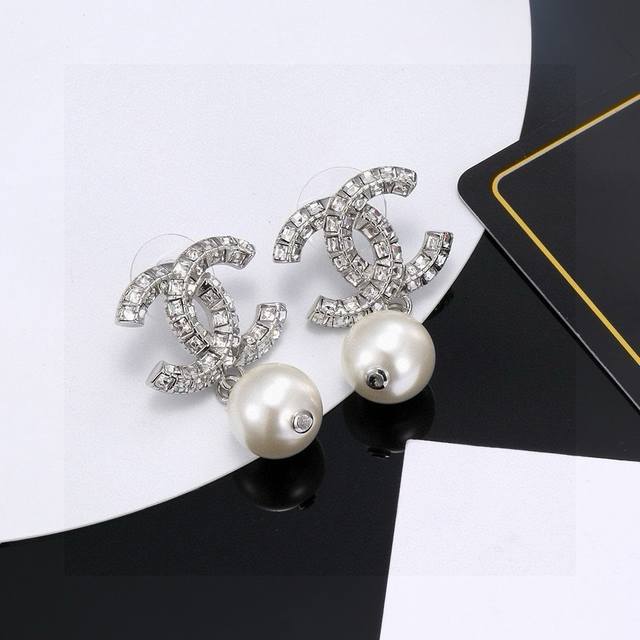 Classic double C rhinestone pearl earrings Swarovski diamonds are so beautiful
