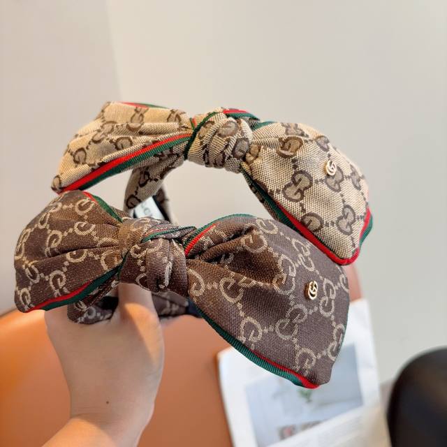 with packaging Gucci classic flower bow wide brim headband, a must-have item fo
