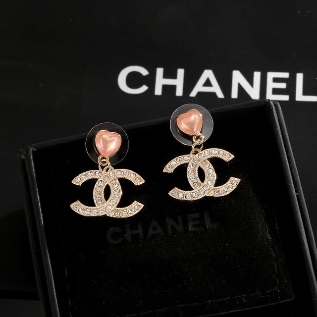 Chanel heart-shaped earrings, more flattering face shape. Surrounded by gold me