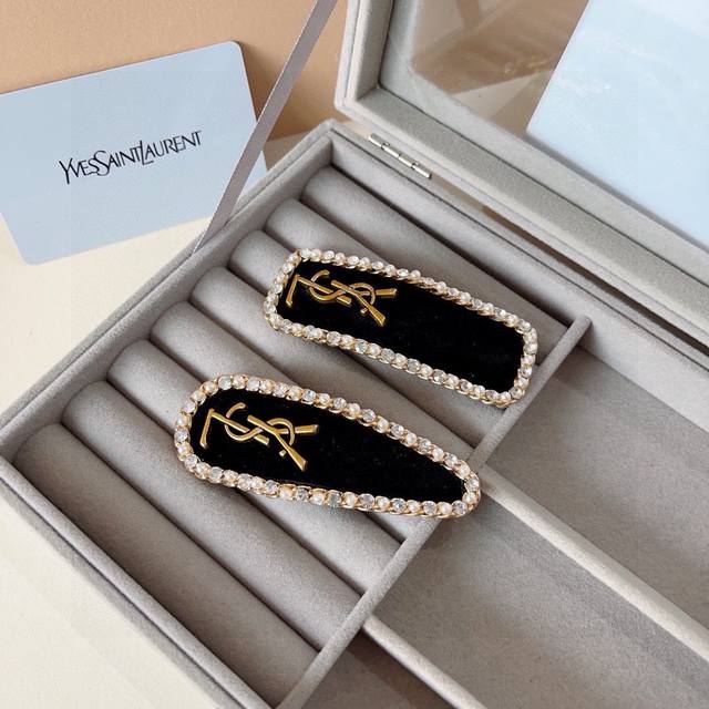 comes with a pair of packaging Yves Saint Laurent's new flocked rhinestone pear