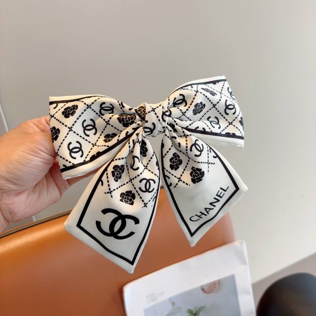 with packaging Chanel Chanel star-style bow hairpin slingshot clip Internet cel