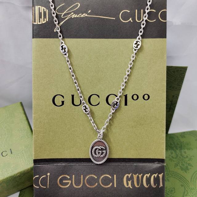 Gucci This necklace has a distressed effect and features the double G, which is