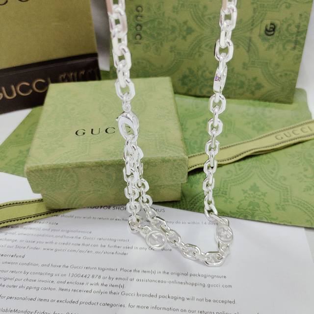 GucciThe interlocking double G design injects visual novelty into this necklace.