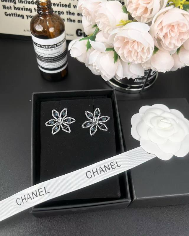 Chanel black pearl flower blue diamond double C earrings DDD