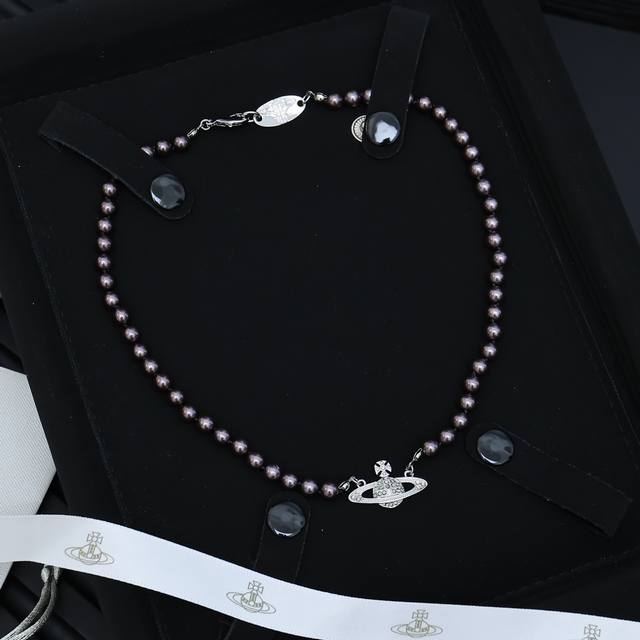 Vivienne Saturn Grey Bead Planet Necklace In the list of must-have items for wo