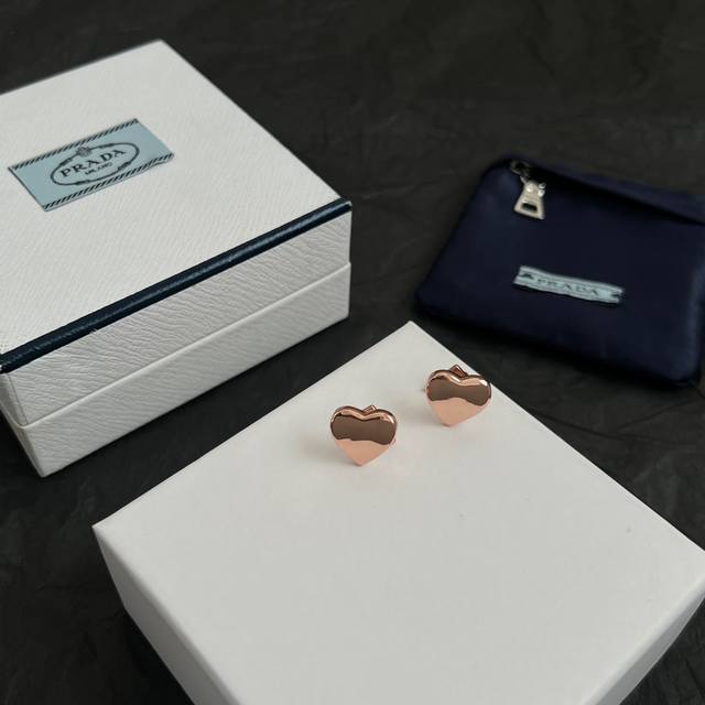 Prada The new Prada triangle earrings are exquisite and gorgeous. The overall de